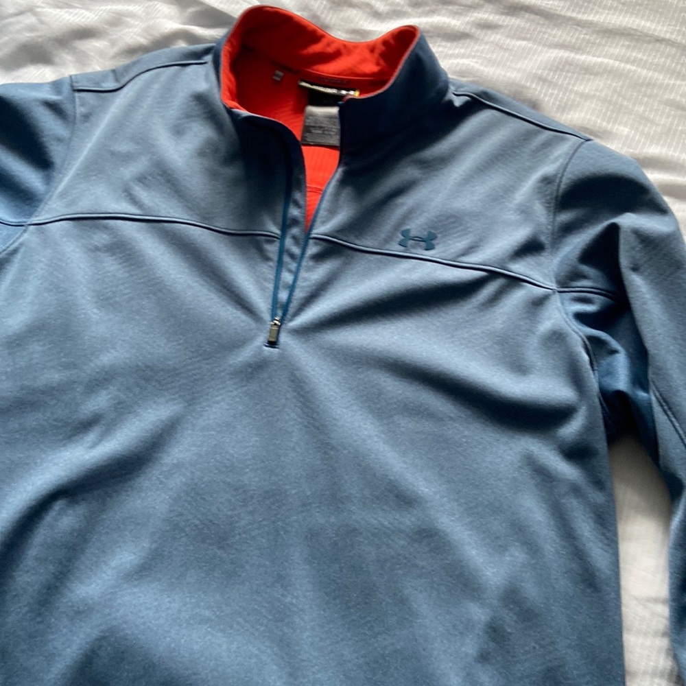 TWO under armour 1/4 zip pullovers.   Excellent quality and shape.